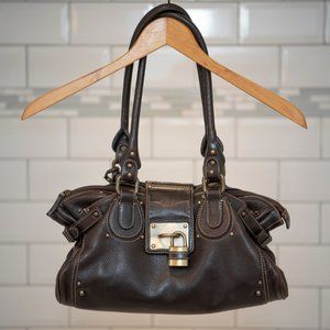 Brown leather lock purse